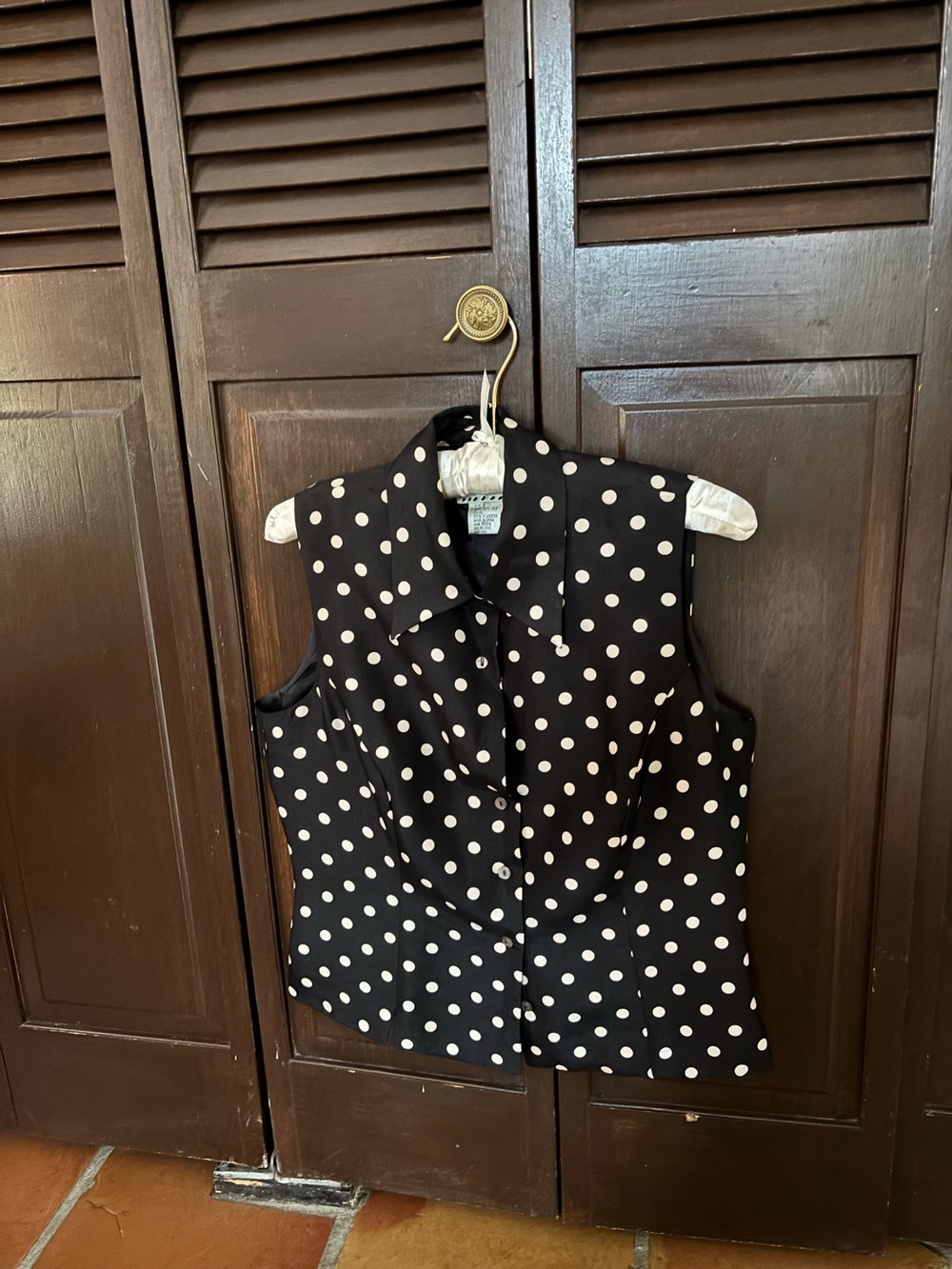 Ice Sleeveless Black Top with White Polka Dots